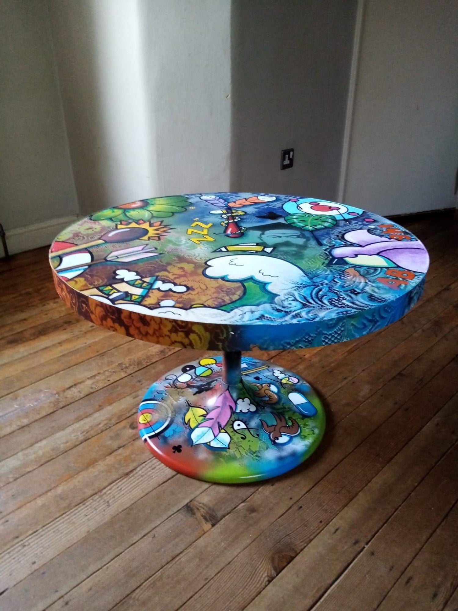 acrylic paint on wooden table
