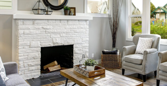 white painted stone fireplace in living room-passionthursday.com