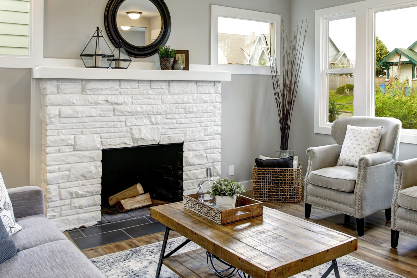 white painted stone fireplace in living room-passionthursday.com